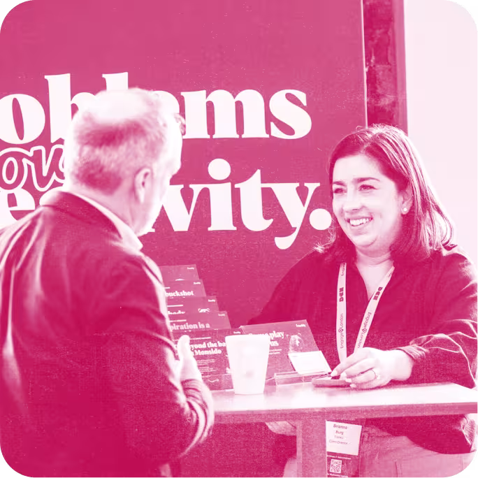 two people talking at a table