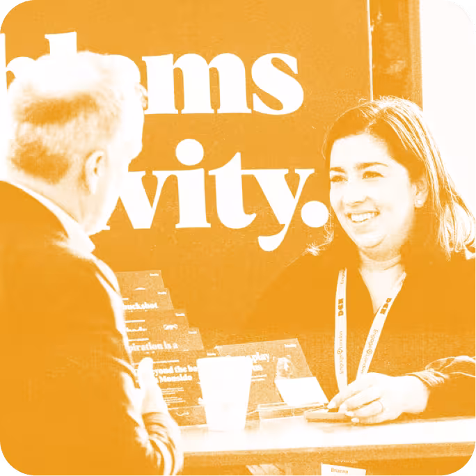 two people talking at a table